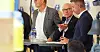 STATUS: De diskuterer hvor saken om norske lønns- og arbeidsvilkår ligger nå, og fremdriften. Kurt-Inge Angell, NSF, henvender seg til statssekretær Even Tronstad Sagbakken, mens Viggo Bondi fra Rederiforbundet ser bort.